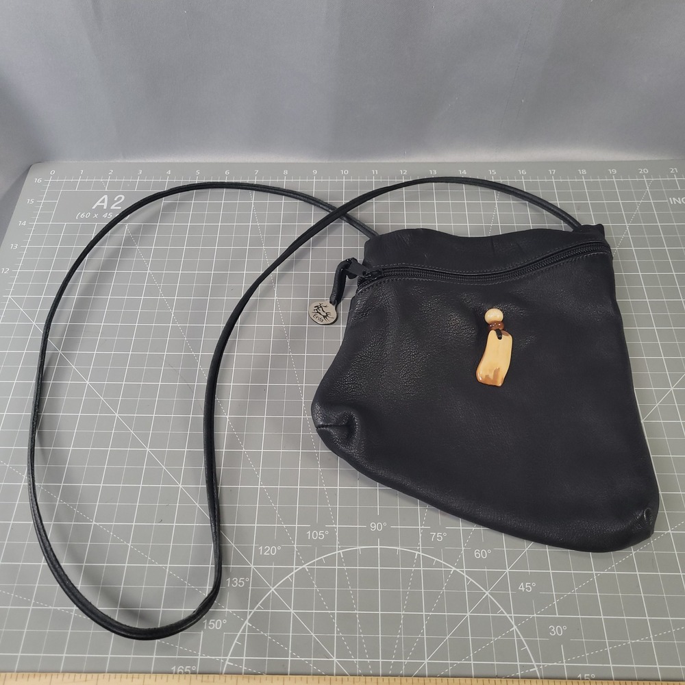 Erda Crossbody Bag Womens Black Leather Asymmetric Bone Charm Made in USA
